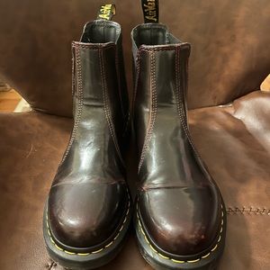 Dark cherry colored shiny Chelsea boot doc martens.